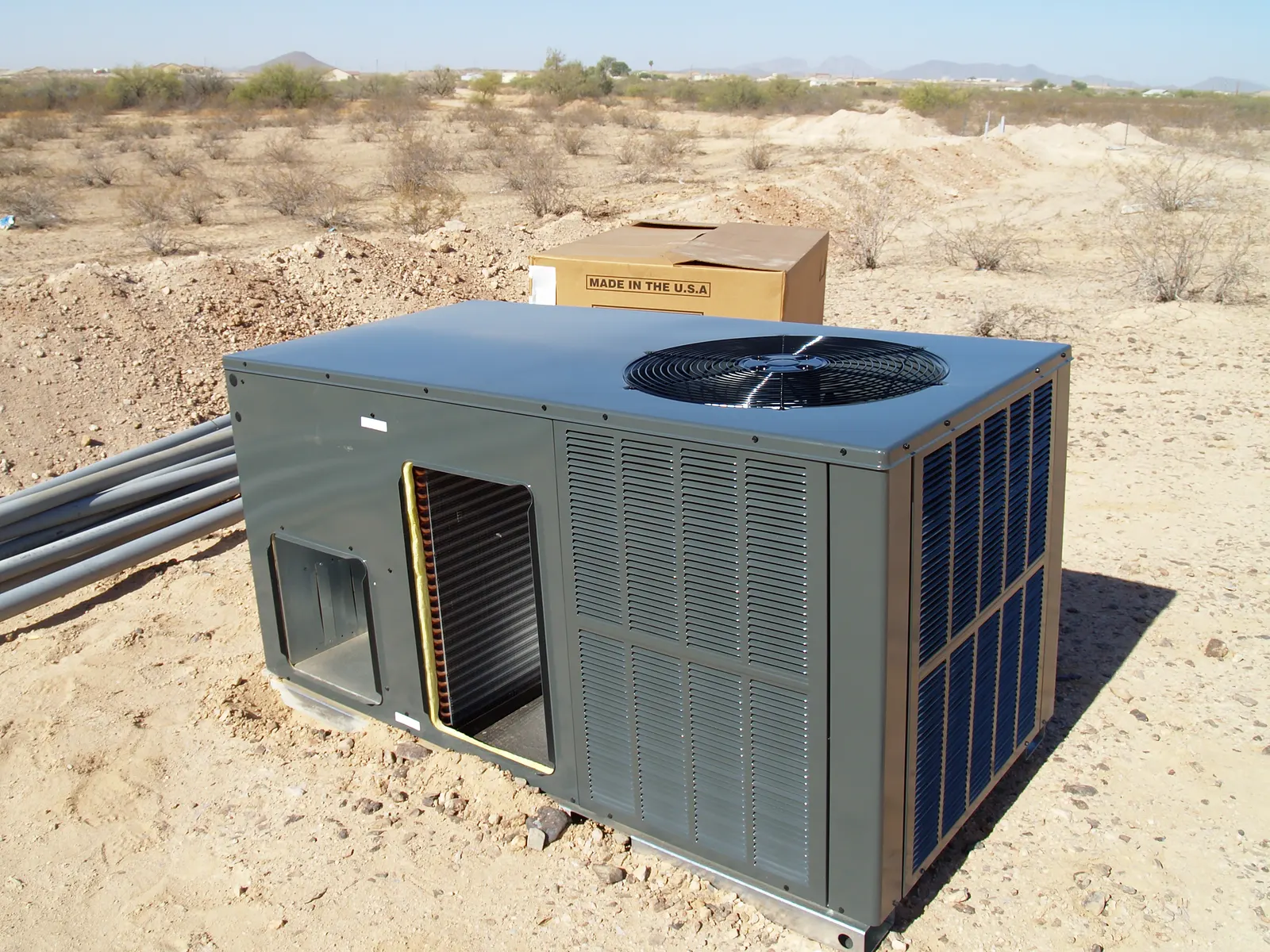 Clean HVAC equipment installation with tidy ductwork