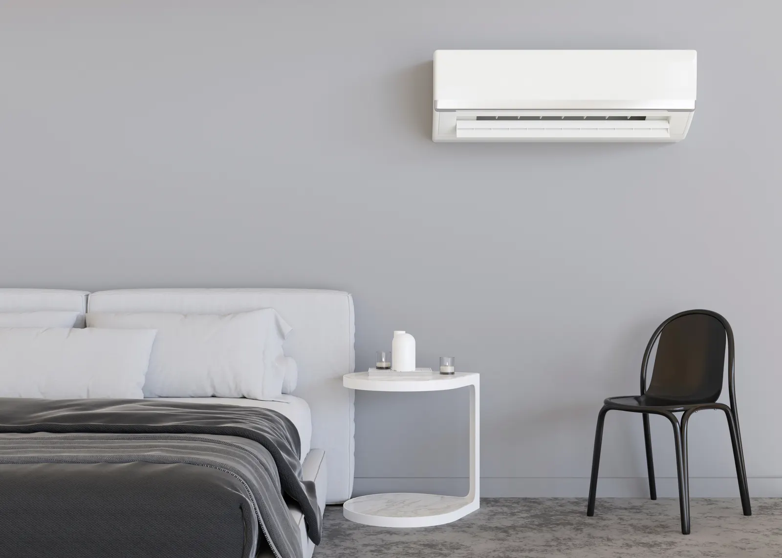 Wall-mounted ductless mini split head in a lived-in room
